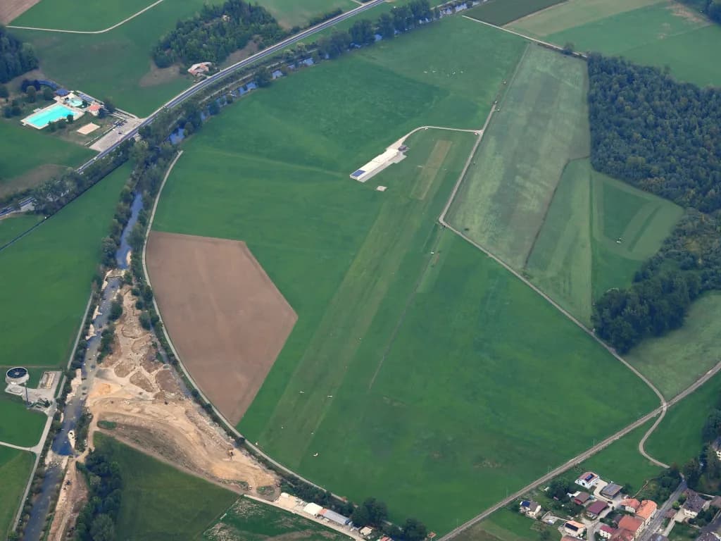 Aerial view of Môtiers Airfield airport infrastructure