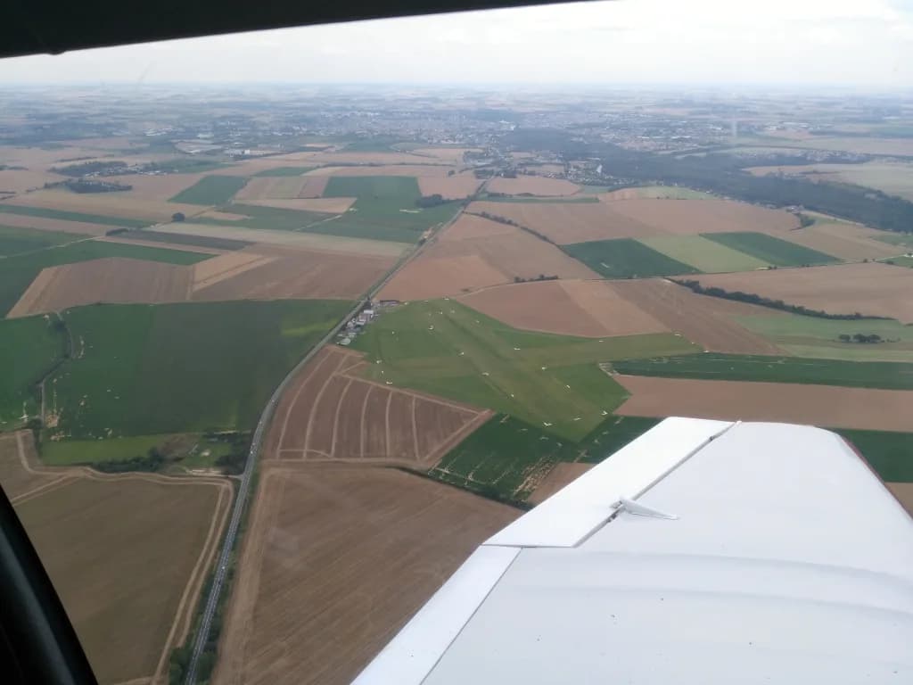 Aerial view of Saint-Quentin-Roupy Airfield airport infrastructure