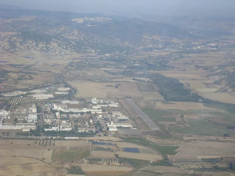 Aerial view of Enrico Mattei Airfield airport infrastructure