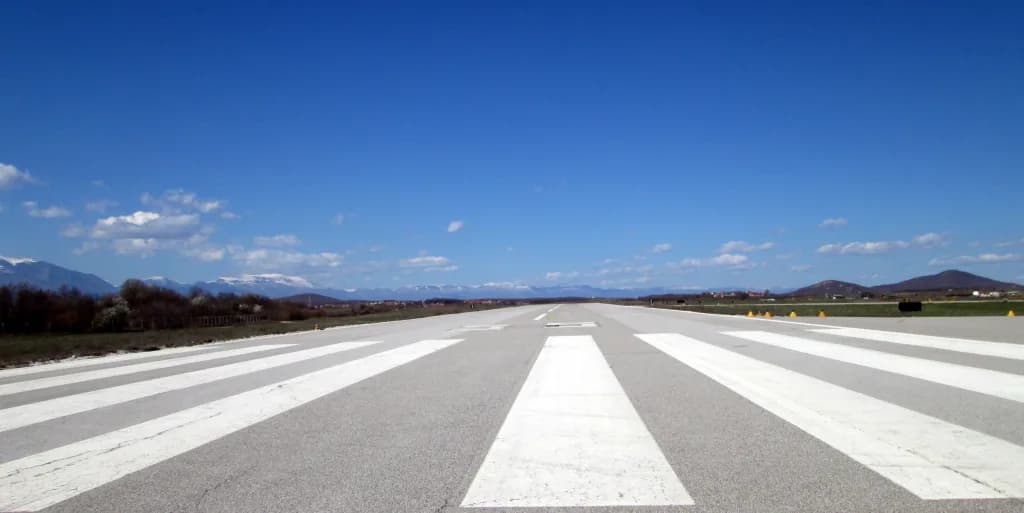Aerial view of Gjakovë Air Base airport infrastructure